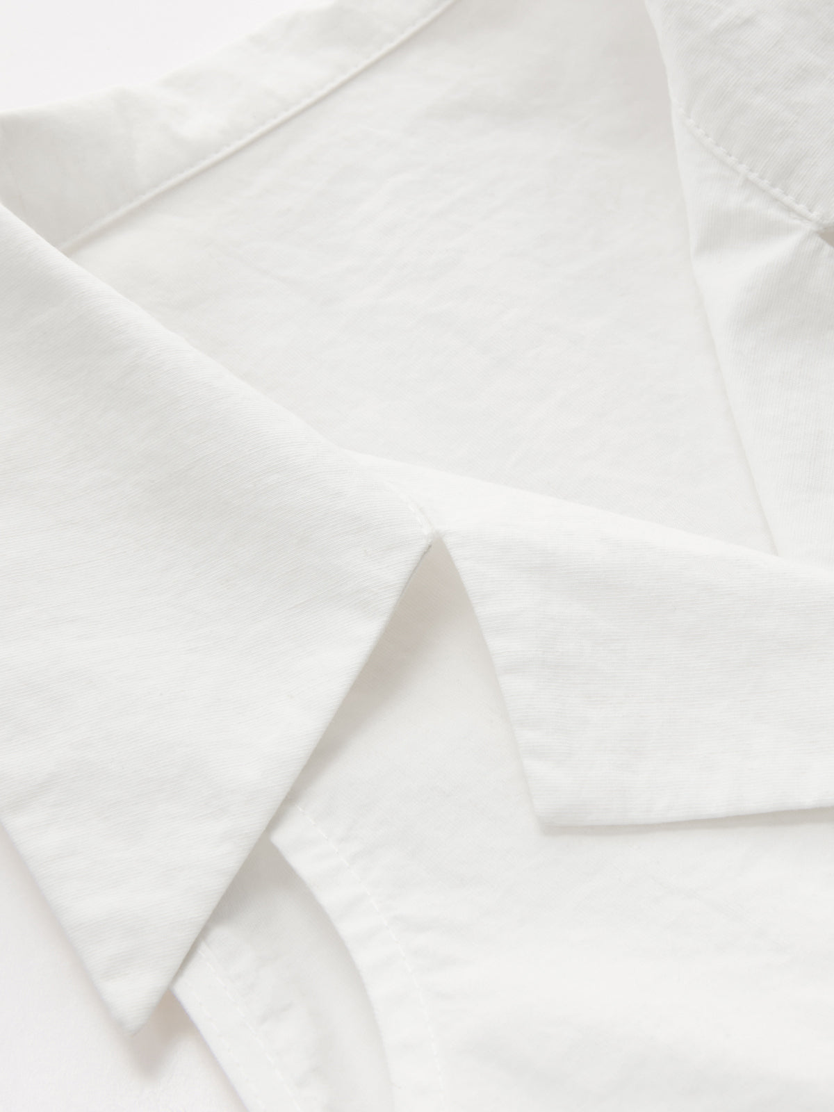Collared Sleeveless Knotted Cropped Blouse