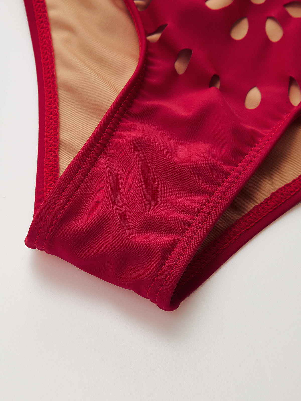 Laser-Cut One-Piece Swimwear & Skirt Set